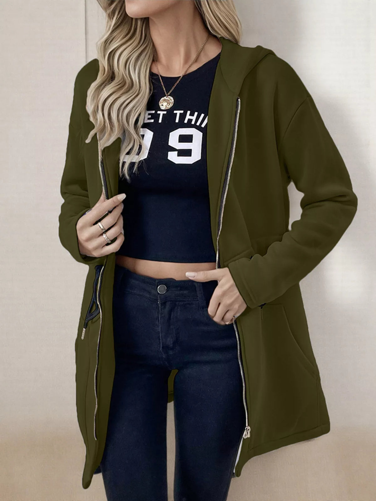 Women's lightweight zip up hoodie jacket in Green with front pockets.