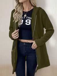 Women's lightweight zip up hoodie jacket in Green with front pockets.
