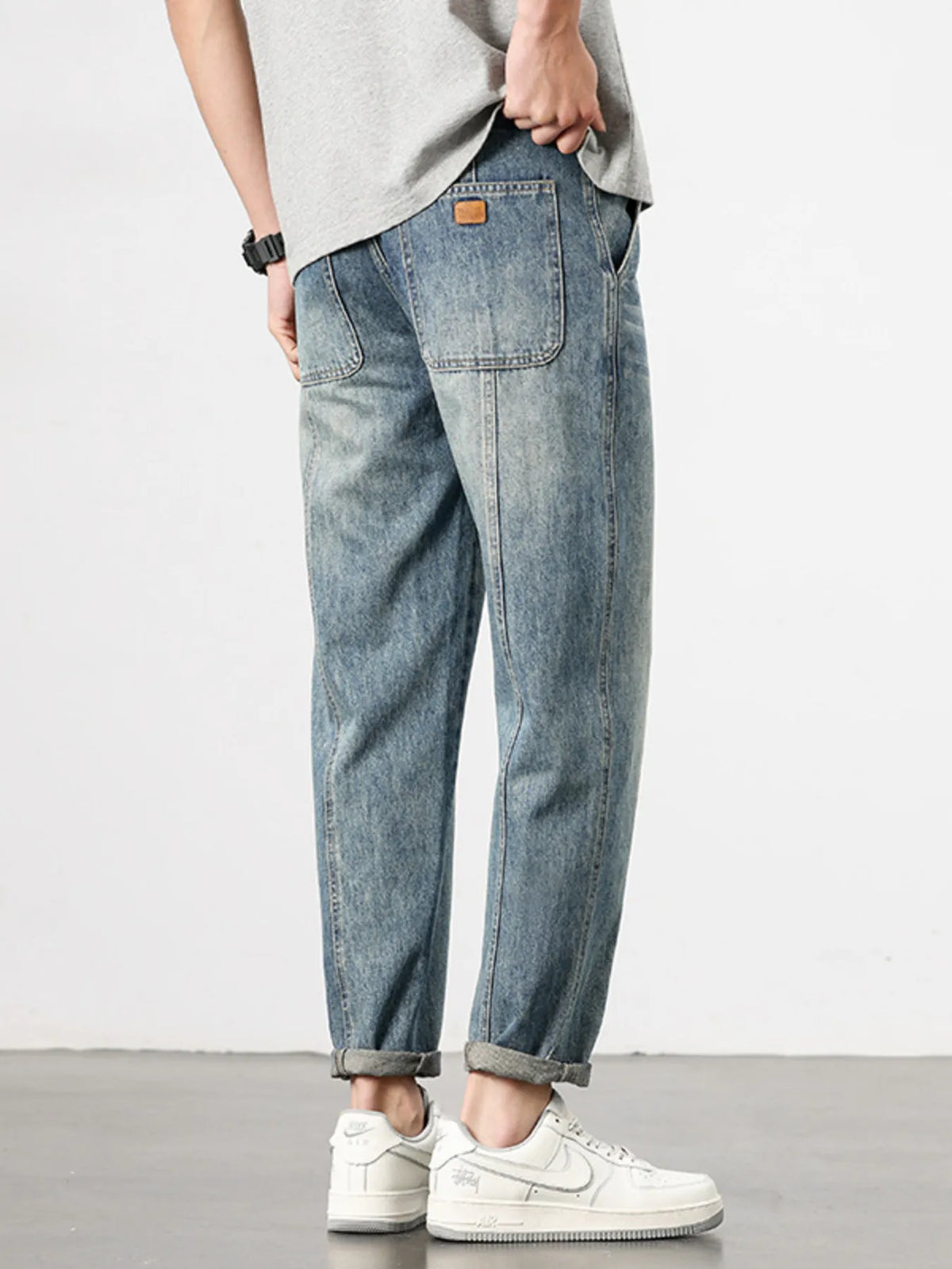 Mens loose fit washed jeans front view, relaxed regular fit casual denim pants