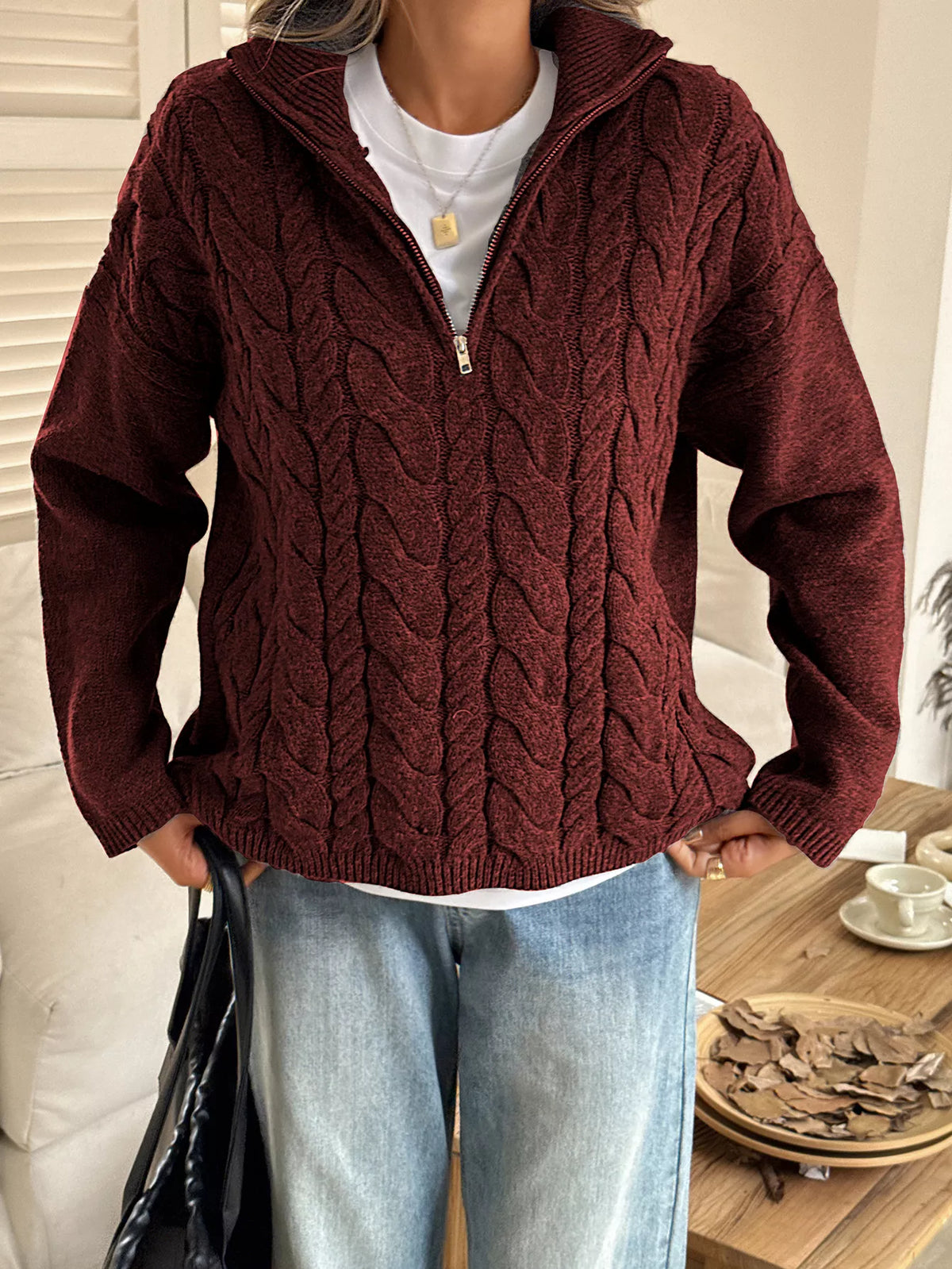 Women's Cable Knit Zip Neck Sweater in burgundy worn with boots