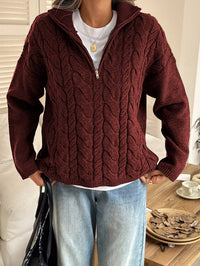 Women's Cable Knit Zip Neck Sweater in burgundy worn with boots