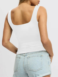 Breathable sleeveless blouse for women, cropped fit, perfect for layering under cardigans or jackets.