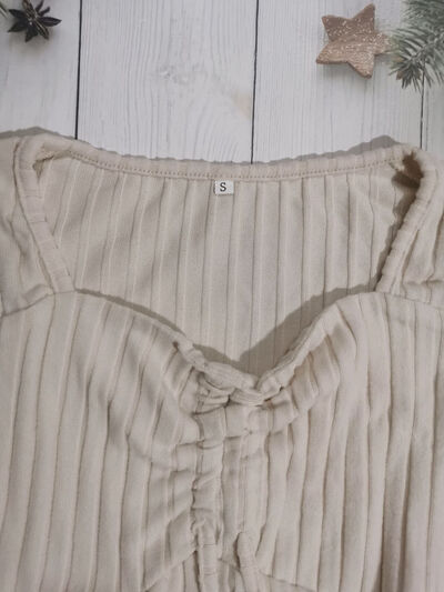 Women’s ruched drawstring ribbed long sleeve top in beige, styled with jeans for casual fall outfit