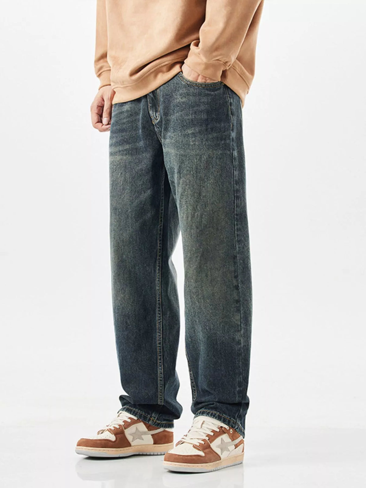 Side profile of men's 90s style wide leg denim pants showcasing the fit.
