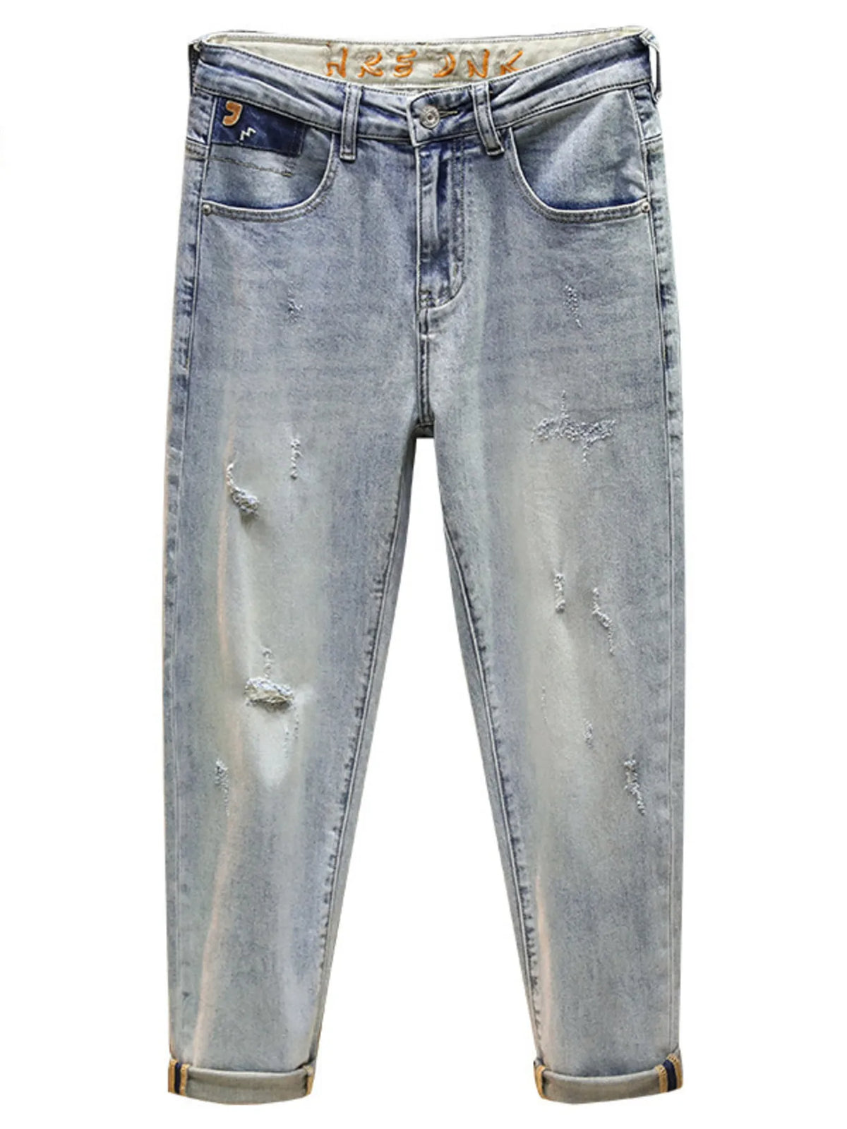 Men's distressed wide leg jeans in washed blue denim with knee rips, 90s grunge style