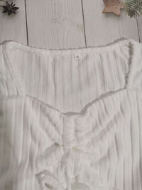 Women’s ruched drawstring ribbed long sleeve top in beige, styled with jeans for casual fall outfit