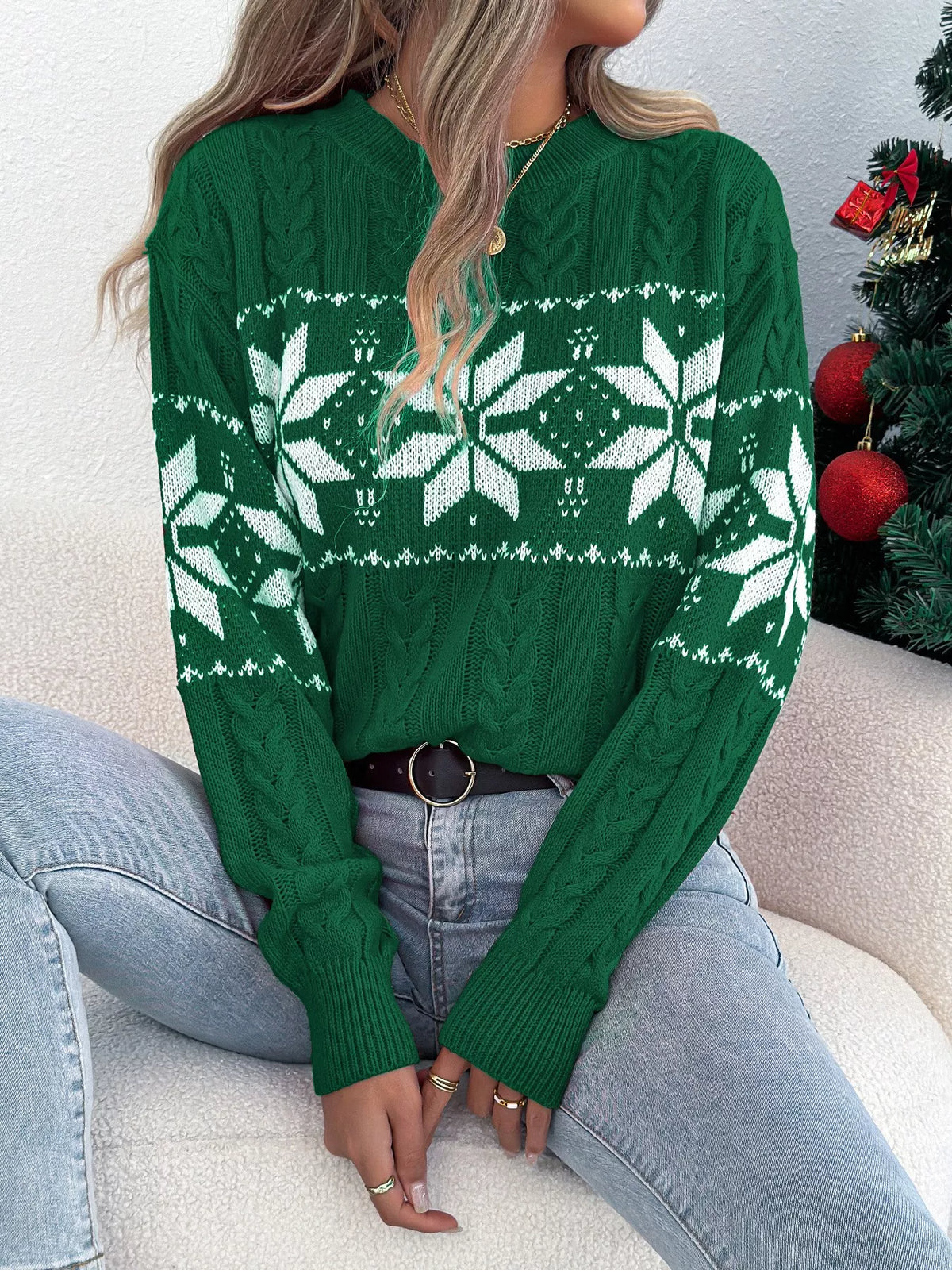 Women's Christmas Cable Knit Sweater with a close-up of the festive snowflake and cable knit pattern.