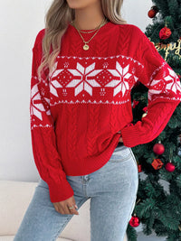Women's Christmas Cable Knit Sweater with a close-up of the festive snowflake and cable knit pattern.