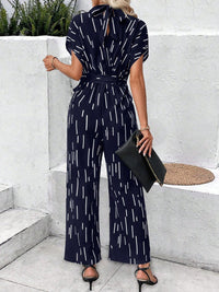 Tied Printed Mock Neck Wide Leg Jumpsuit Trandify deal