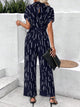 Tied Printed Mock Neck Wide Leg Jumpsuit Trandify deal