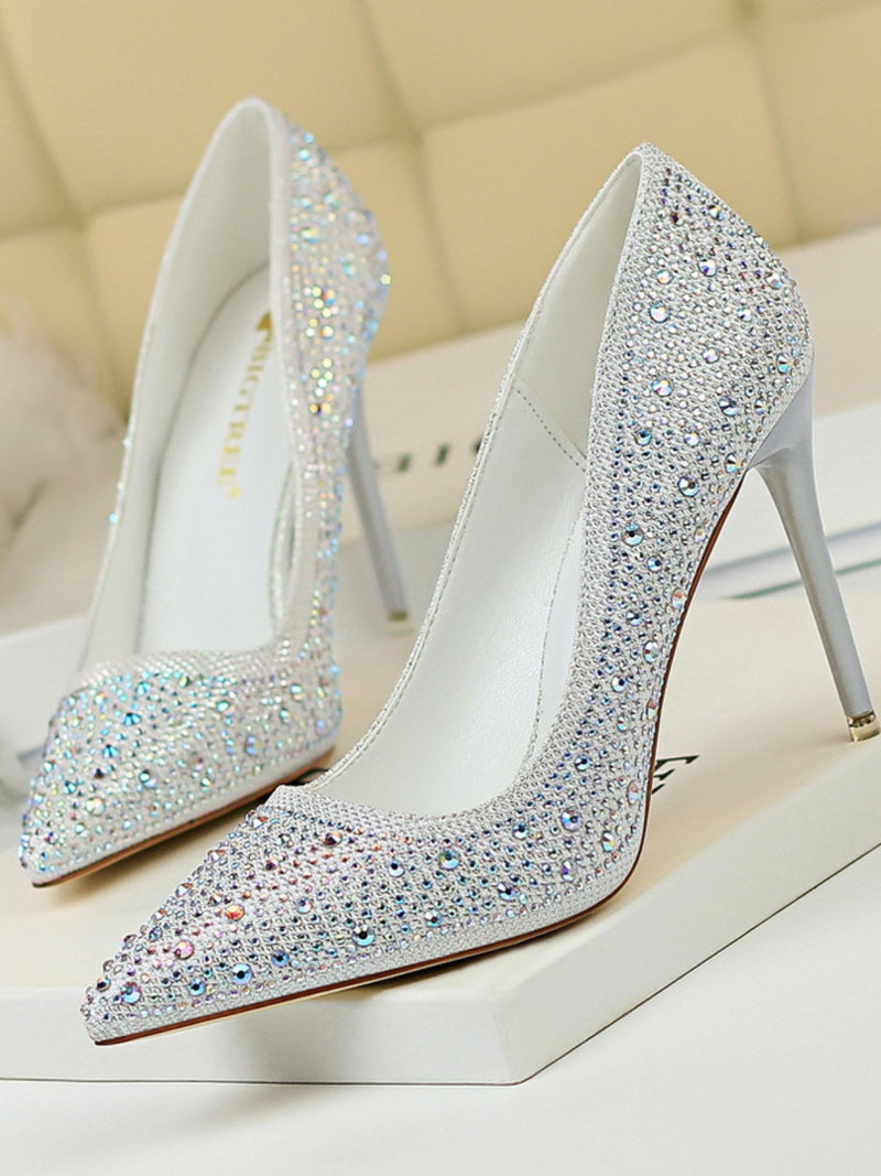 Pointed Toe Rhinestone Decor Stiletto Pumps featuring a sleek stiletto heel, rhinestone accents, and a sharp pointed toe for an elegant, glamorous look.