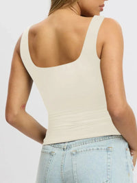 Breathable sleeveless blouse for women, cropped fit, perfect for layering under cardigans or jackets.