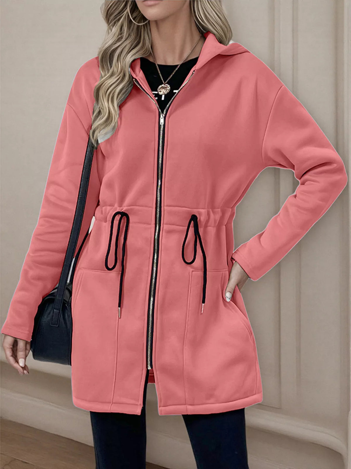 Women's lightweight zip up hoodie jacket in Pink with front pockets.