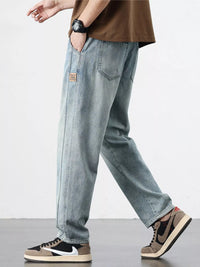 Men's Relaxed Fit Jeans in classic blue wash, comfort stretch fabric for all-day wear
