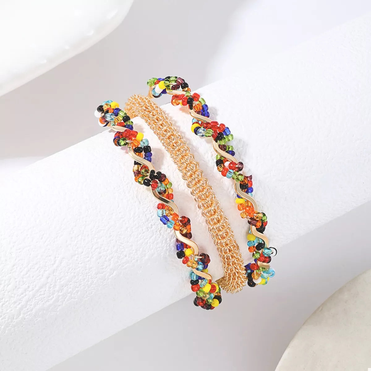 18K Gold Plated Three-Layer Bracelet Stack on a wrist, showing the dainty layered chain design.