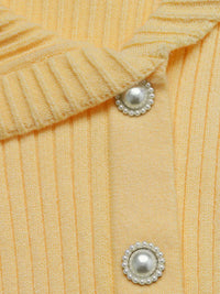 Women's asymmetrical ribbed button up cardigan in yellow, cozy chic style.
