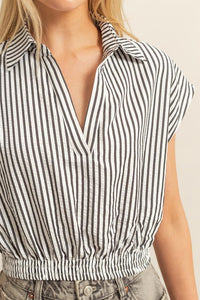 Striped Elastic Hem Blouse with Johnny collar and cap sleeves on a mannequin.