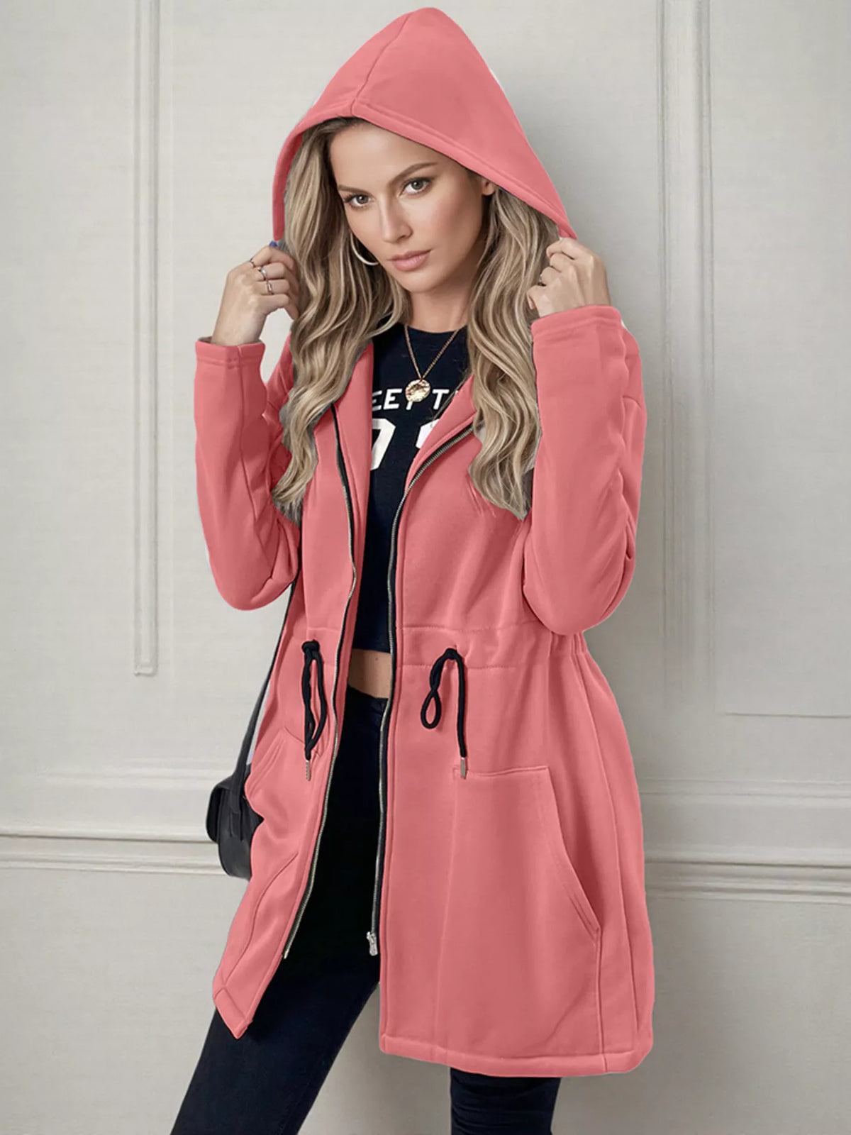 Women's lightweight zip up hoodie jacket in Pink with front pockets.