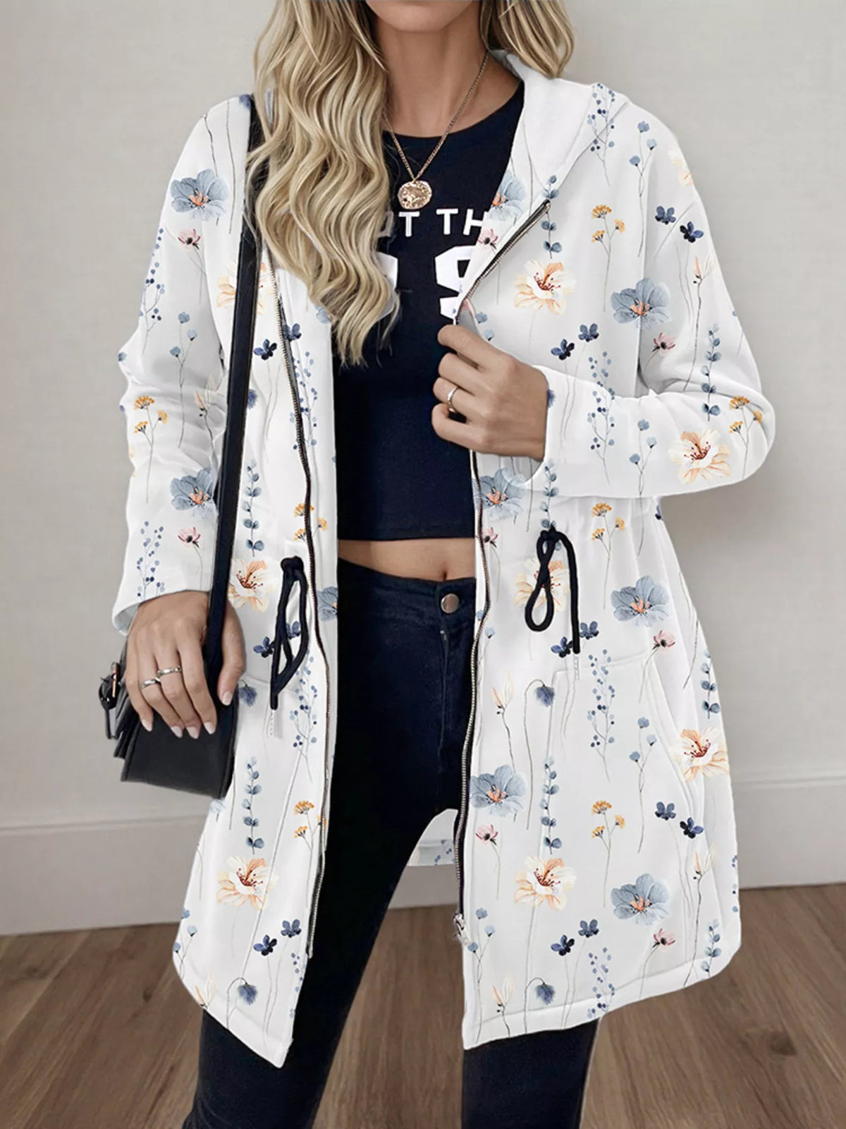 Women's lightweight zip up hoodie jacket in White with front pockets.