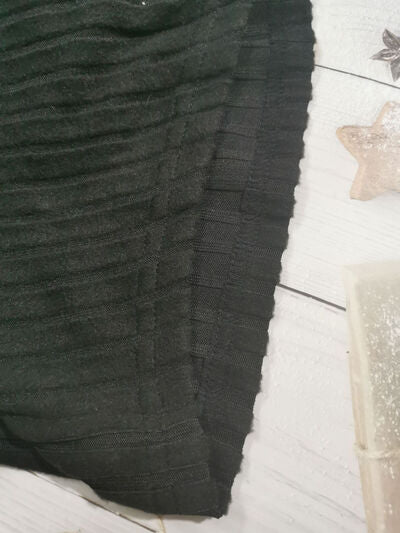 Women’s ruched drawstring ribbed long sleeve top in beige, styled with jeans for casual fall outfit