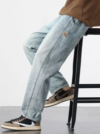 Men's Relaxed Fit Jeans in classic blue wash, comfort stretch fabric for all-day wear