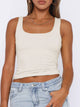 Breathable sleeveless blouse for women, cropped fit, perfect for layering under cardigans or jackets.