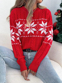 Women's Christmas Cable Knit Sweater with a close-up of the festive snowflake and cable knit pattern.