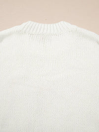 Women's Embroidered Bow Boots Drop Shoulder Sweater in cream, laid flat showing the detailed boot and bow design on the front.