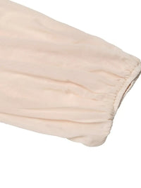 Women's sweetheart neck balloon sleeve bodysuit outfit, Apricot, styled with jeans.