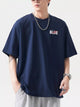 Mens oversized t-shirt in 100% cotton, plus size comfort fit model showing relaxed style