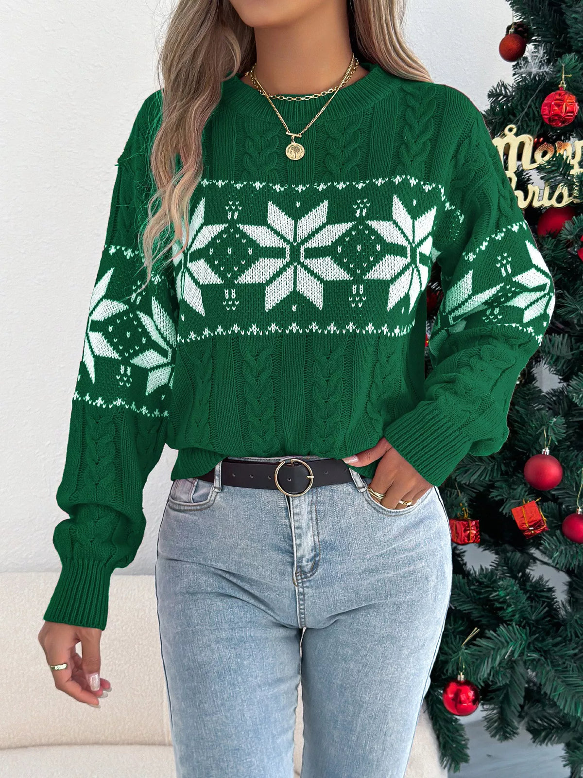 Women's Christmas Cable Knit Sweater with a close-up of the festive snowflake and cable knit pattern.