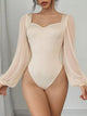 Women's sweetheart neck balloon sleeve bodysuit outfit, Apricot, styled with jeans.