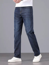 Men's straight fit jeans in a dark wash.