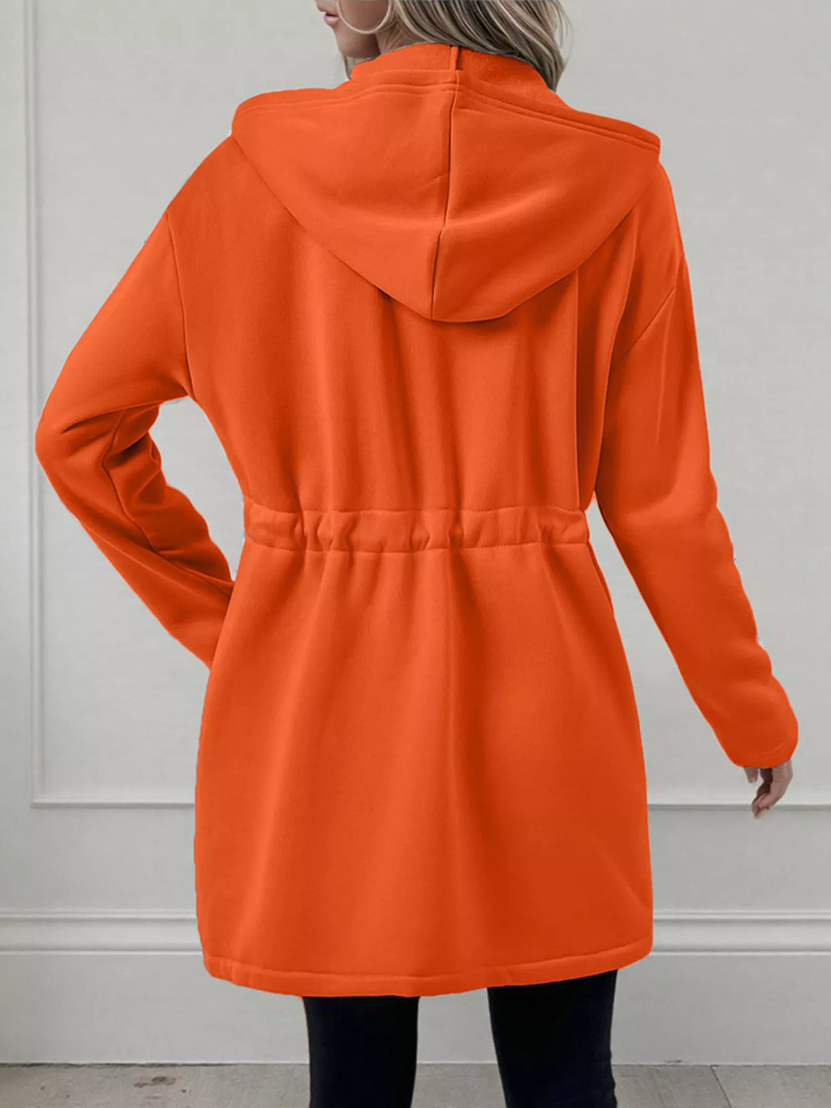 Women's lightweight zip up hoodie jacket in Orange with front pockets.