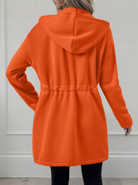 Women's lightweight zip up hoodie jacket in Orange with front pockets.