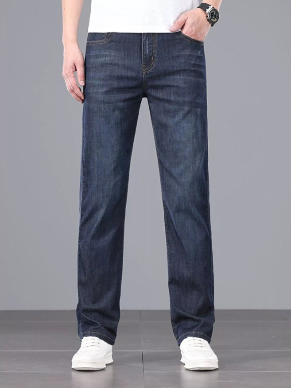 Men's straight fit jeans in a dark wash.