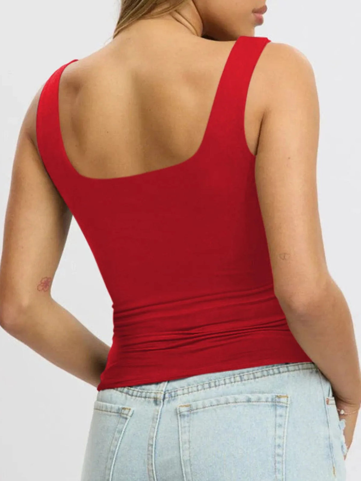 Breathable sleeveless blouse for women, cropped fit, perfect for layering under cardigans or jackets.