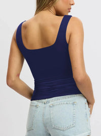 Breathable sleeveless blouse for women, cropped fit, perfect for layering under cardigans or jackets.