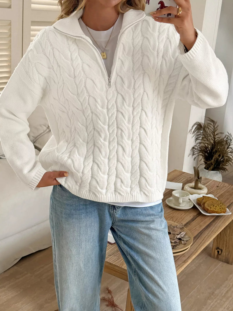 Women's Cable Knit Zip Neck Sweater in White worn with boots