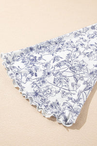 Women’s stylish mock neck blouse in floral print, U.S. fashion trend 2025