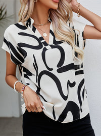Printed Notched Short Sleeve Blouse Trandify deal