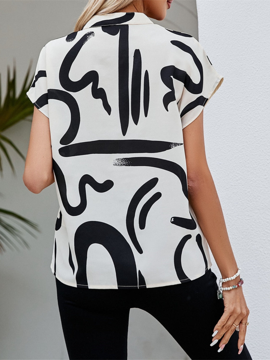 Printed Notched Short Sleeve Blouse Trandify deal