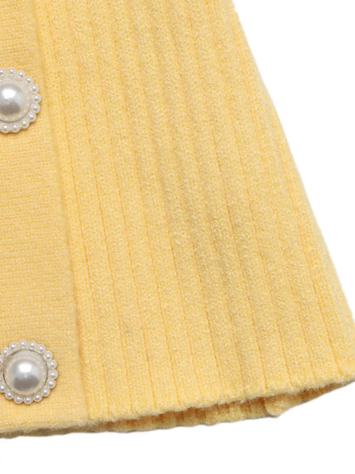 Women's asymmetrical ribbed button up cardigan in yellow, cozy chic style.