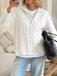 Women's Cable Knit Zip Neck Sweater in White worn with boots