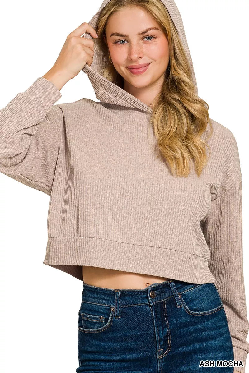 Ribbed Crop Hoodie in Being showing the drop-shoulder and oversized fit on a model.