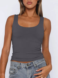 Breathable sleeveless blouse for women, cropped fit, perfect for layering under cardigans or jackets.