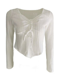 Women’s ruched drawstring ribbed long sleeve top in beige, styled with jeans for casual fall outfit