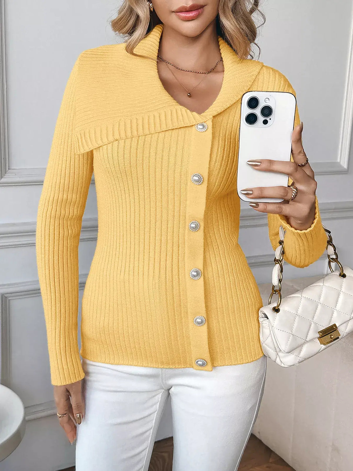 Women's asymmetrical ribbed button up cardigan in yellow, cozy chic style.