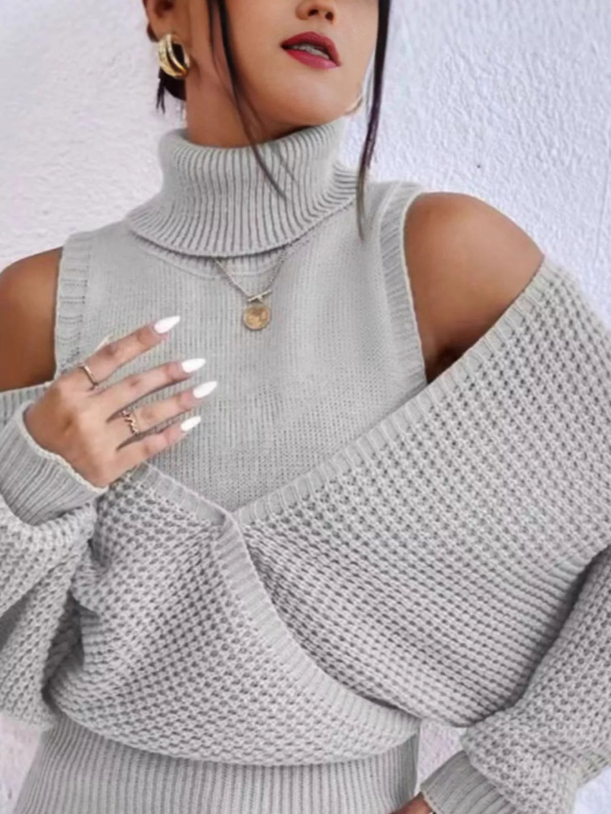 Oversized Cold Shoulder Sweater in Gray knit worn with denim jeans