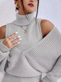 Oversized Cold Shoulder Sweater in Gray knit worn with denim jeans